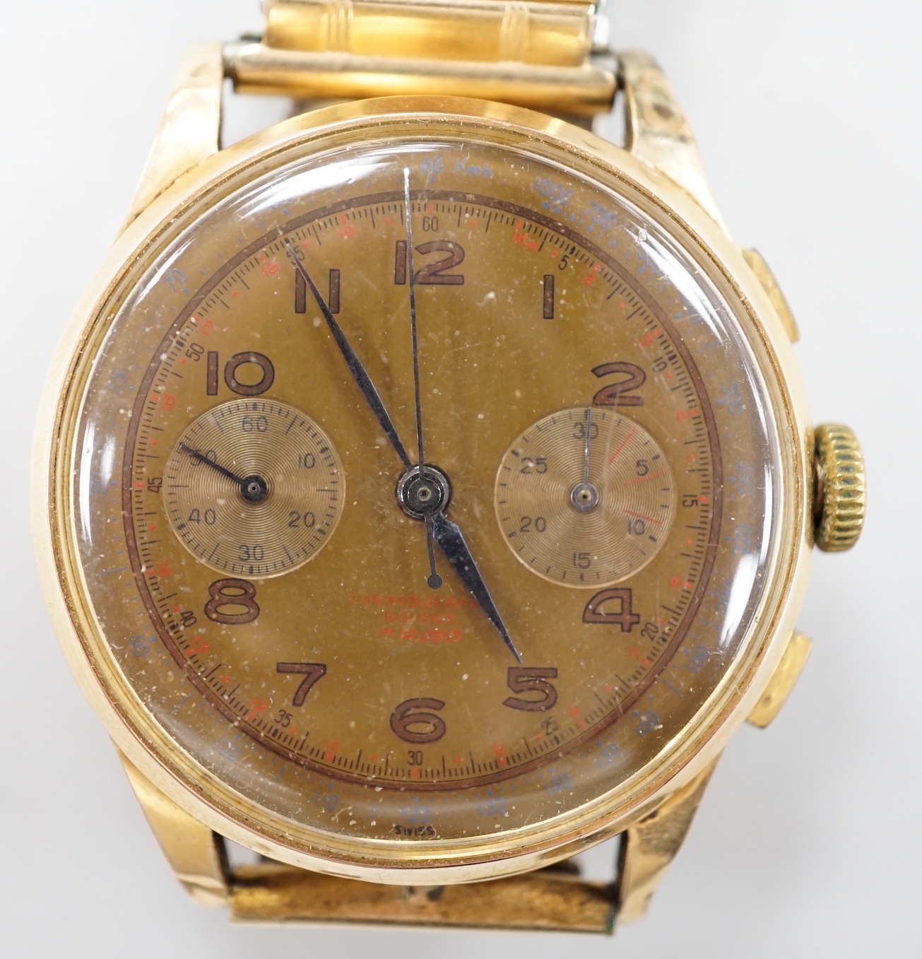 A 1950's? Swiss 18k chronograph manual wind wrist watch, on later associated flexible bracelet.